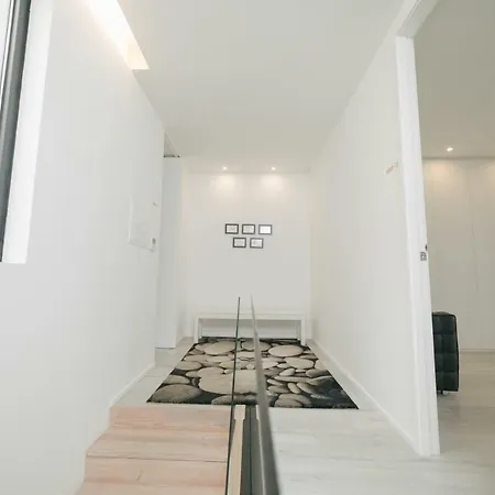 Retreat To A Stylish Concept House In Porto