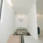 Retreat To A Stylish Concept House In Porto